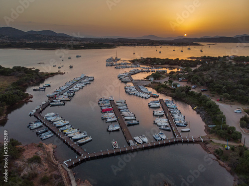 Aerial view on a sardinian harbor at the sunset photo