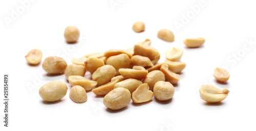 Salted and fried, roasted peanuts, pile isolated on white
