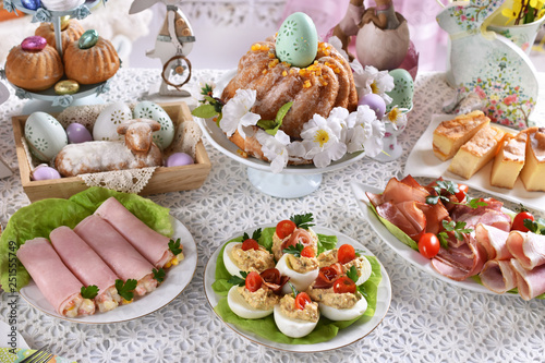 Canvas Print easter table with traditional dishes and cakes