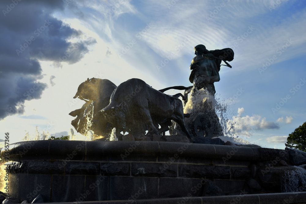 The Gefion Fountain close by the Copenhagen harbour in the sunset light The Gefion Fountain close by the Copenhagen harbour in the sunset light