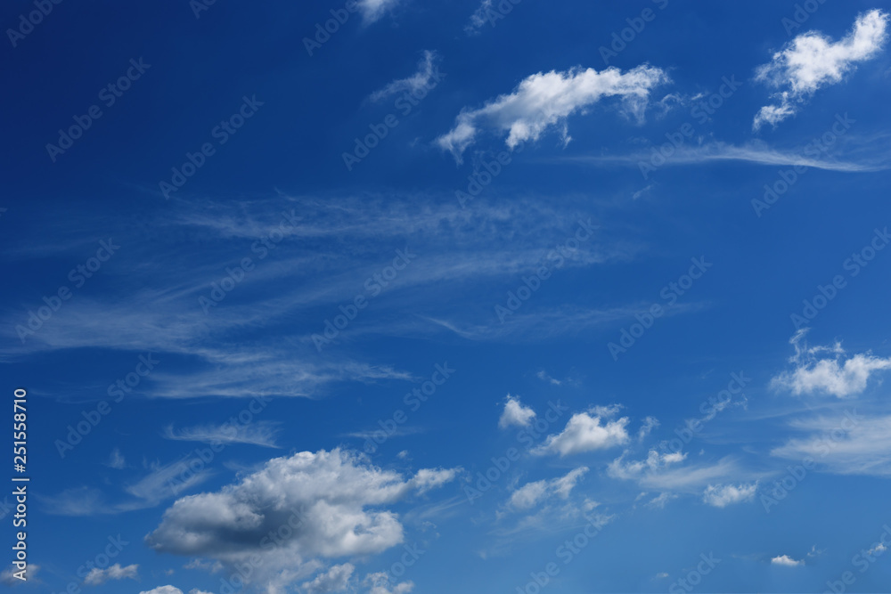 beautiful blue sky with white cumulus and cirrus clouds up to the horizon beautiful blue sky with white cumulus and cirrus clouds up to the horizon
