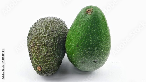 Ripe avocado fruit on white background