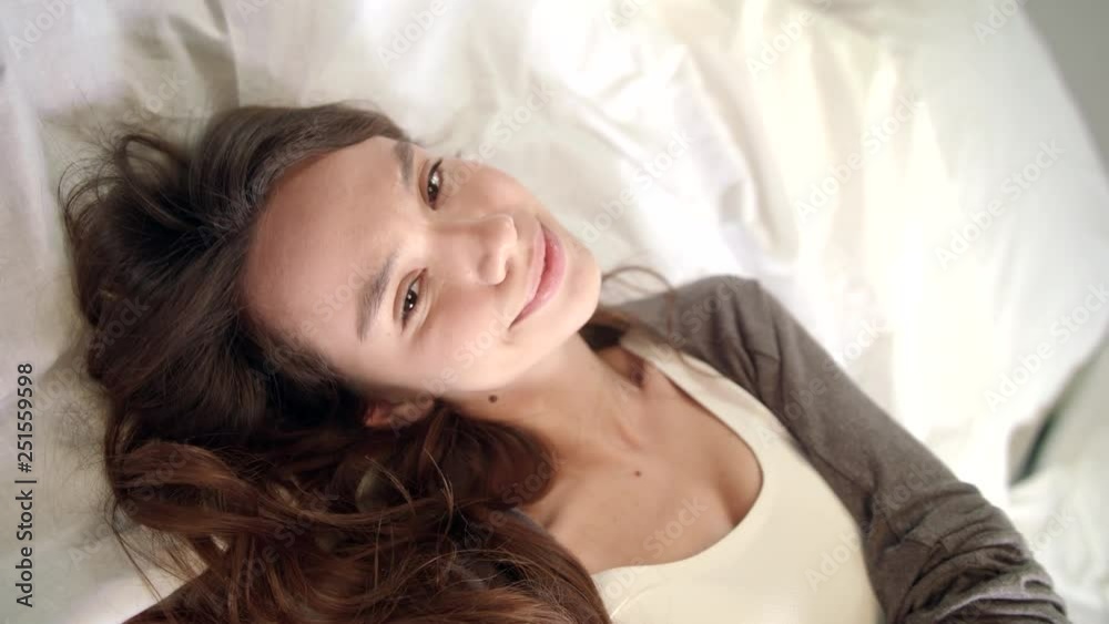Sensual woman flirting with camera in bed. POV of girl flirting at video call Sensual woman flirting with camera in bed. POV of girl flirting at video call