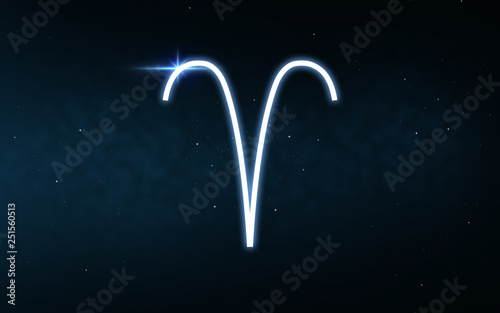 astrology and horoscope - aries sign of zodiac over dark night sky and stars background photo