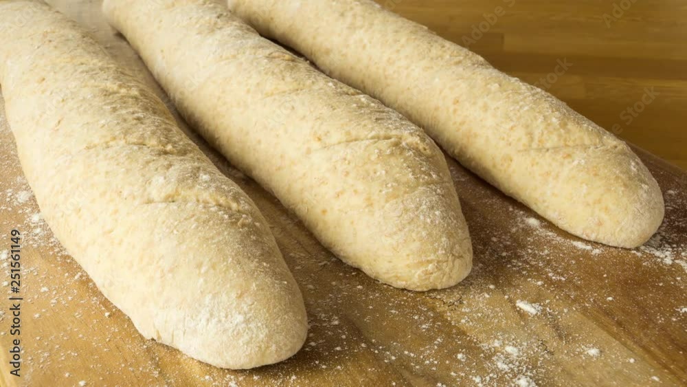 Dough fermenting into loaf of bread Dough fermenting into loaf of bread