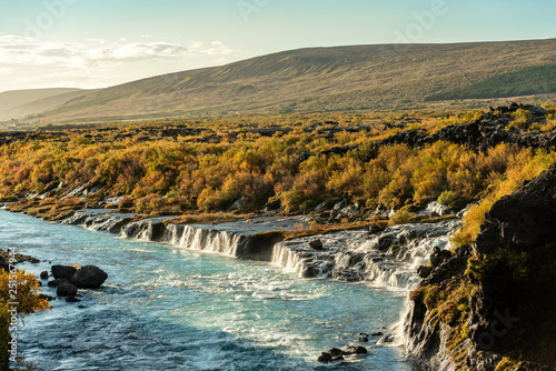 Hraunfossar in west Iceland, in vibrant autumn colors photo