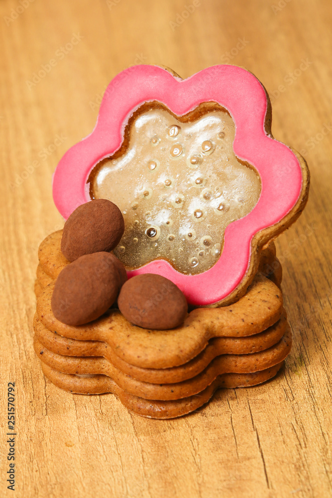 Homemade Ginger Cookies in the shape of Jewelry box on the wooden background. Closeup view. Homemade Ginger Cookies in the shape of Jewelry box on the wooden background. Closeup view.