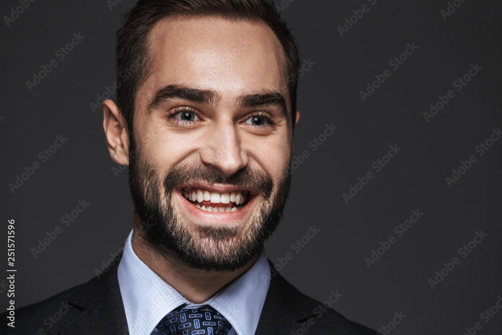Close up of a handsome young smiling business man Close up of a handsome young smiling business man