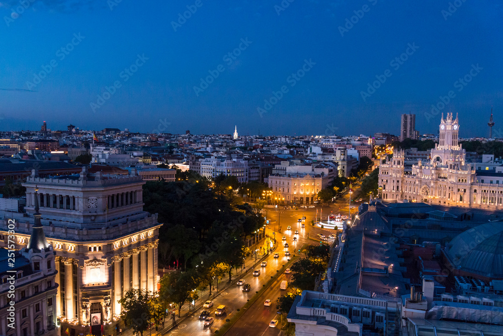 View of the skyline and night traffic on Calle de Alcata, from the roof terrace of Círculo de Bellas Artes, Cultural Arts centre in central Madrid, Spain