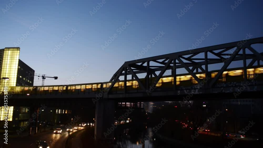 Berlin, Germany, a subway train crossing a brigde near the station Gleisdreieck in the evening Berlin, Germany, a subway train crossing a brigde near the station Gleisdreieck in the evening