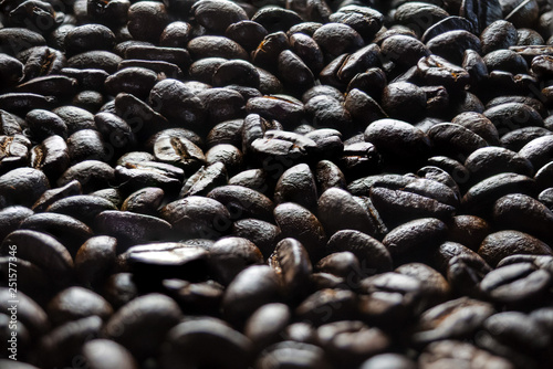 Coffee cup and coffee beans on table