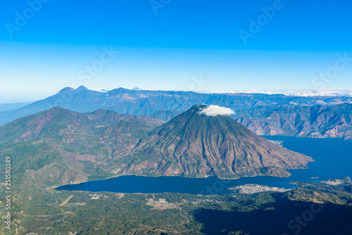 Volcano San Pedro at Lake Atitlan in highlands of Guatemala - Village Santiago and San Pedro you can see -  Aerial View photo