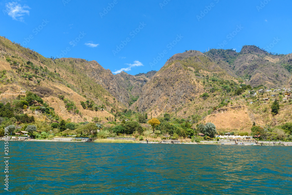 Shore of Santa Cruz la Laguna at Lake Atitlan in vulcano landscape of Guatemala