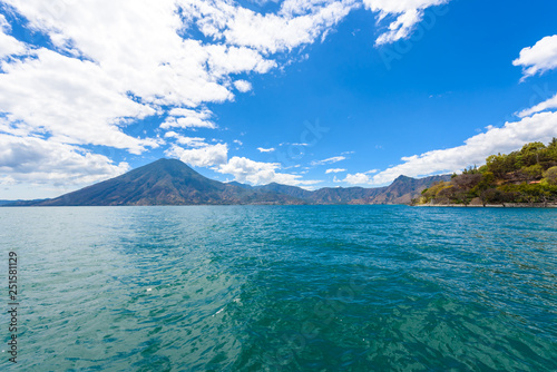 Shore of Santa Cruz la Laguna at Lake Atitlan in vulcano landscape of Guatemala photo