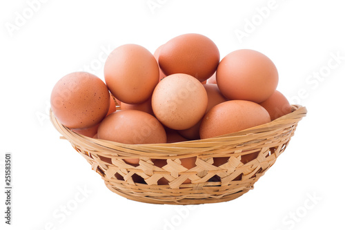 Wallpaper Mural Chicken eggs in basket on isolated white background. Torontodigital.ca