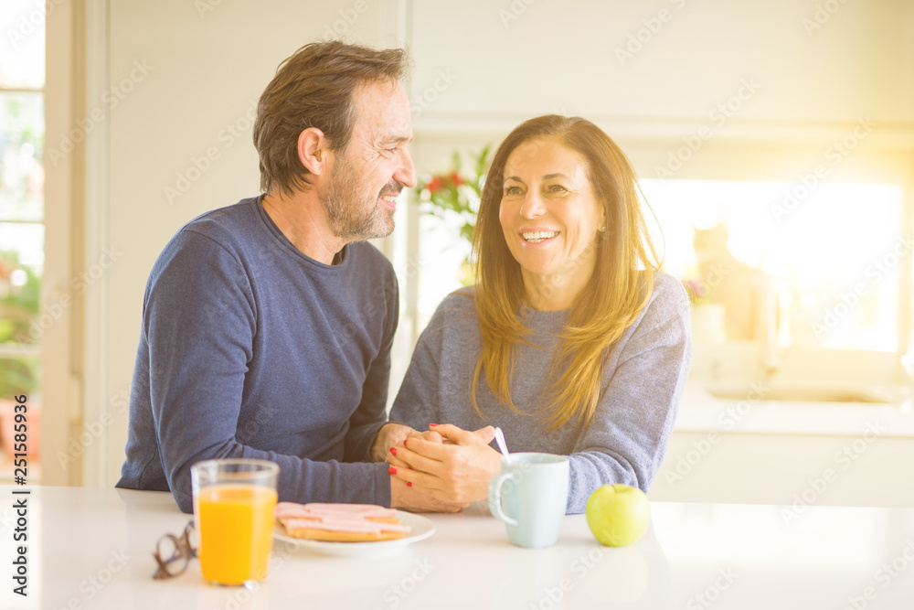 © Krakenimages.com - Beautiful romantic middle age couple having healthy breaskfast in the morning at home