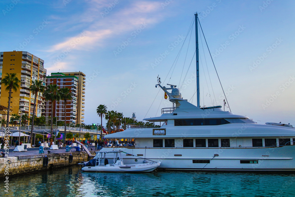 Fototapeta premium white yacht in the marina sunset