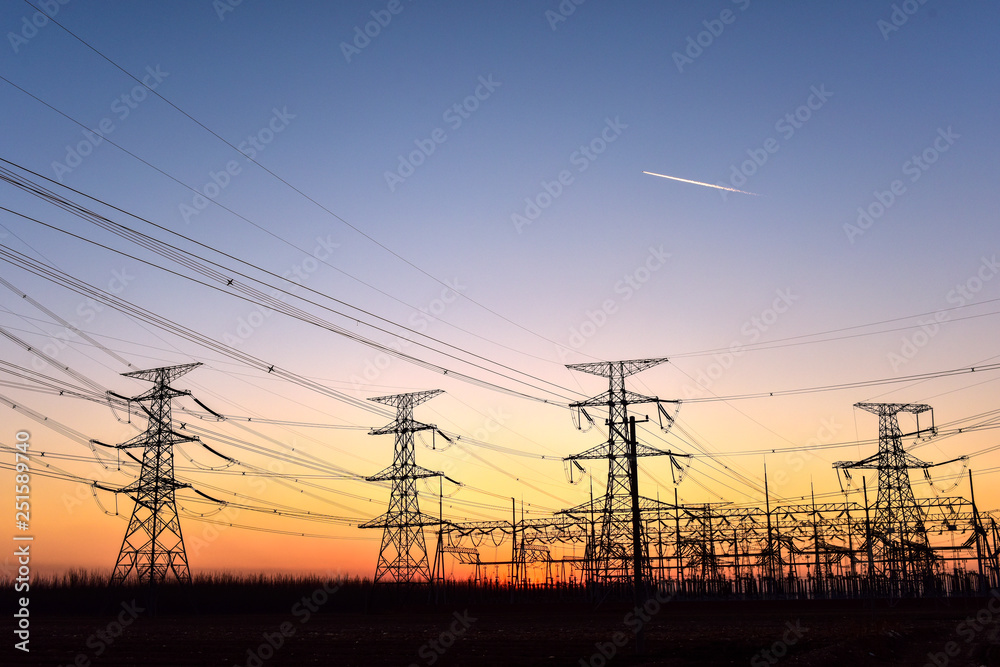 Contour of Transmission Tower at Sunset