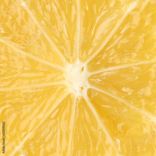 Background of fresh juicy lemon texture. Macro