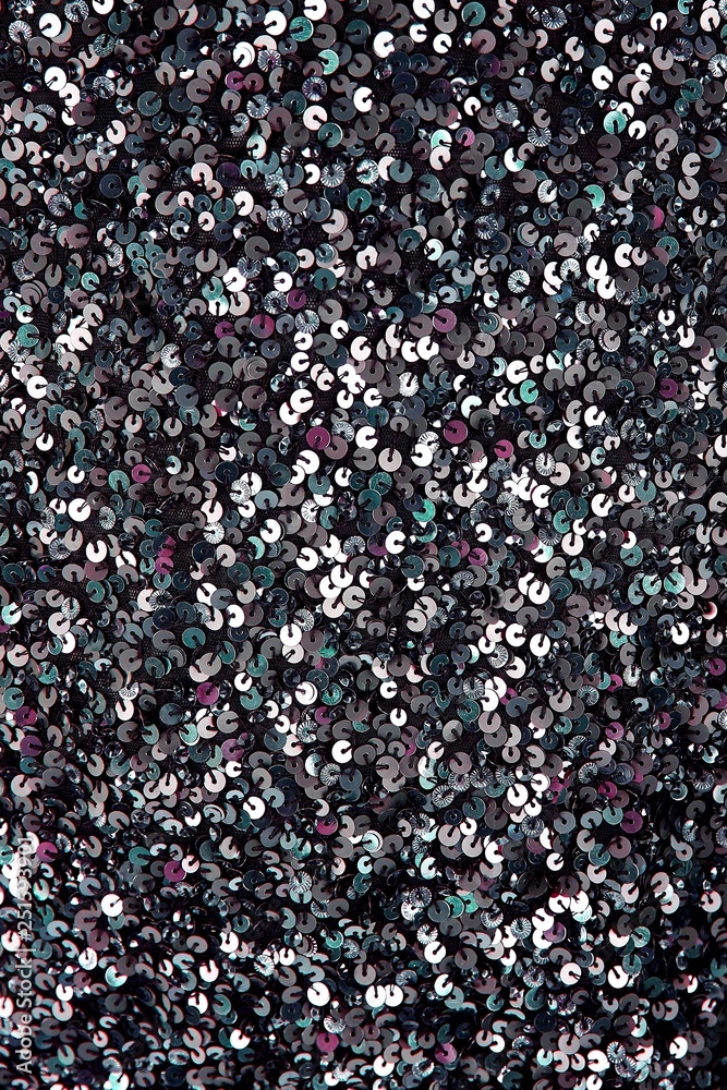Fabric with sequins and sequins of bright colors. Fashion glitter fabric, sequins. Shiny surface Fabric with sequins and sequins of bright colors. Fashion glitter fabric, sequins. Shiny surface