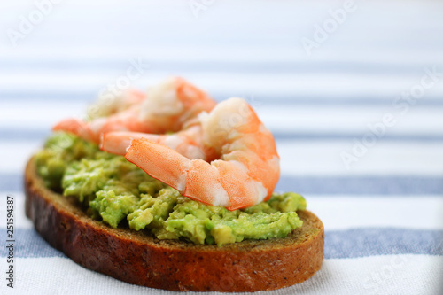 closeup sandwich with avocado guacomole and seafood srimp photo