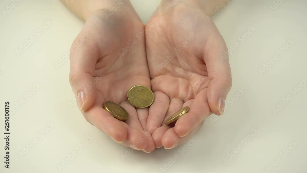Euro coins in human hands. Economy concept. Euro coins in human hands. Economy concept.
