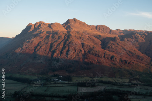 First light on the Langdale Pikes from Side Pike  Lake District  UK