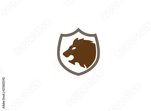 Lion head open mouth  and roaring inside the shield for logo design illustration