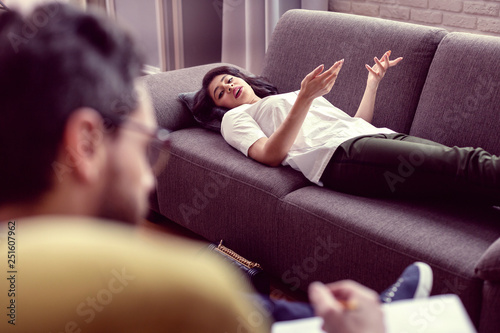 Nice good looking woman looking at the therapist