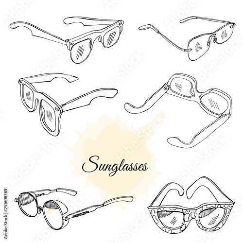 Collection of hand drawn sunglasses. Monochrome sketch objects isolated on white background.