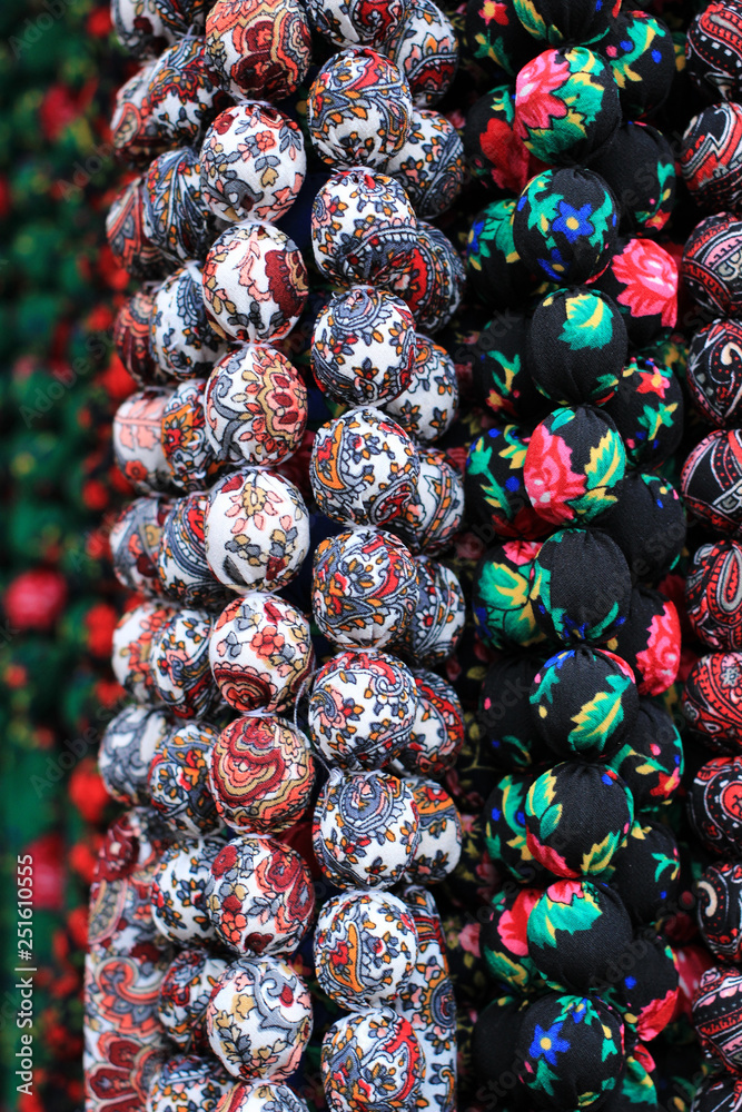 Decorations of balls made of fabric with different patterns.