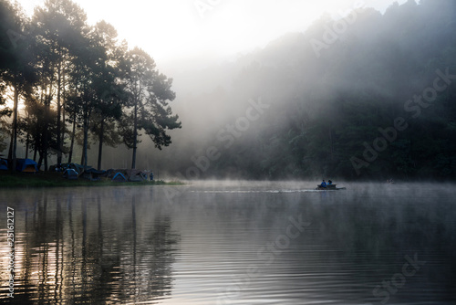 camping and travel Beatiful nature panorama view of Pang Ung lake in the mist at sunrise.
