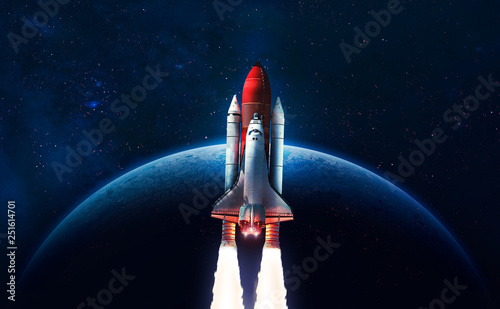 Fototapeta Naklejka Na Ścianę i Meble -  Space shuttle launch in the open space over the Earth. Blue gradient. Space art wallpaper. Elements of this image furnished by NASA