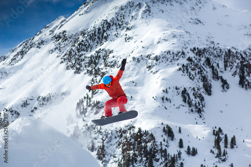 Austria, Innsbruck, Snowboarder jumping