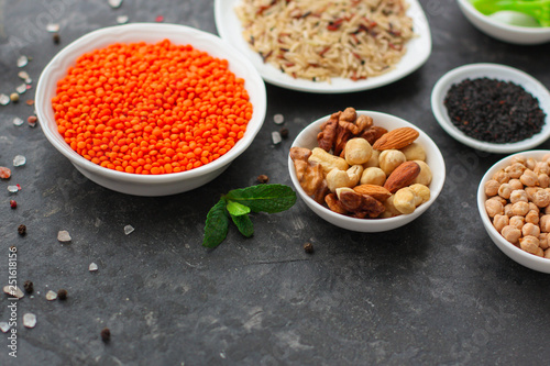 lentils, healthy food concept (legumes, greens, spinach and more) superfood. Food background