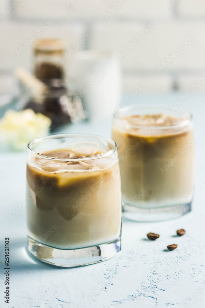Iced bulletproof cold brew coffee. Selective focus, space for text. Iced bulletproof cold brew coffee. Selective focus, space for text.
