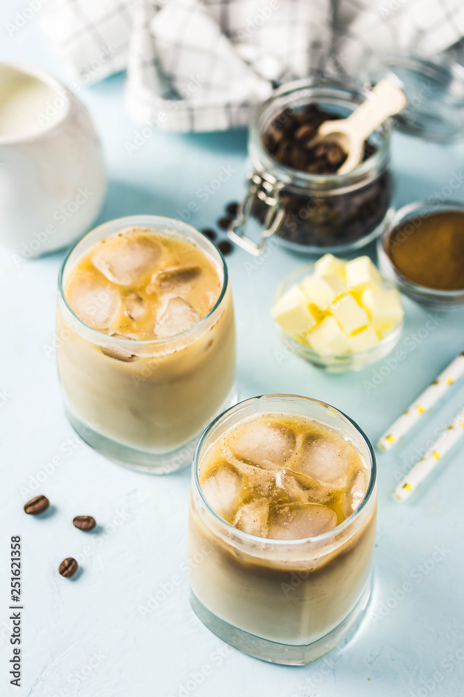 Iced bulletproof coffee. Selective focus, space for text. Iced bulletproof coffee. Selective focus, space for text.