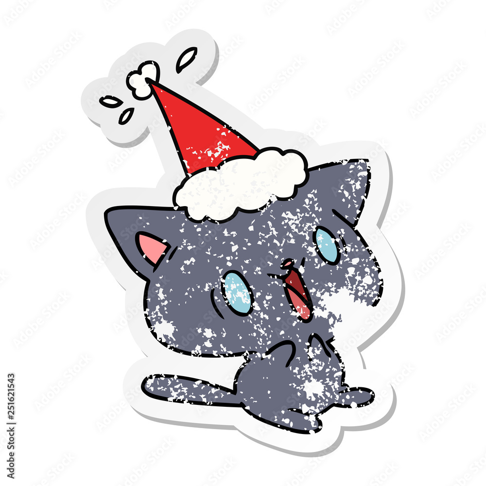 Obraz premium christmas distressed sticker cartoon of kawaii cat