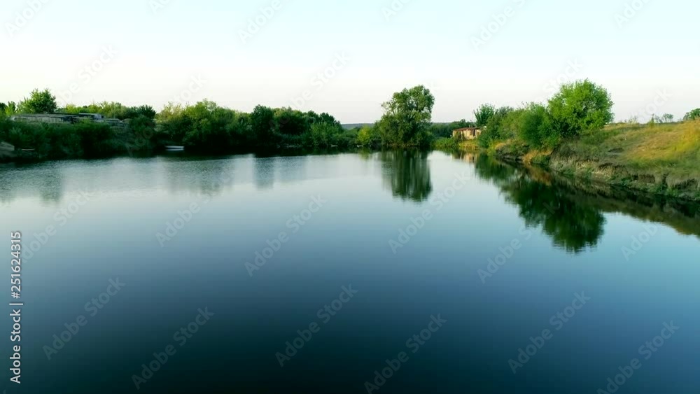 Aerial view of river between countryside fields Aerial view of river between countryside fields
