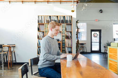 Man using laptop in office