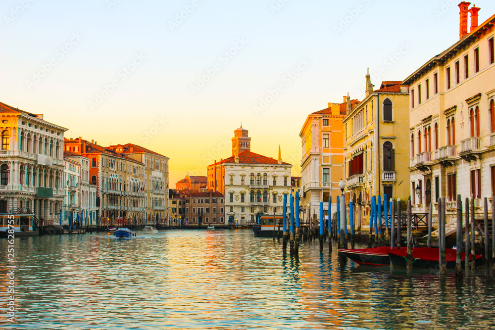 Fototapeta premium Sunny day in Venice. Narrow streets, canals and beautiful architecture.