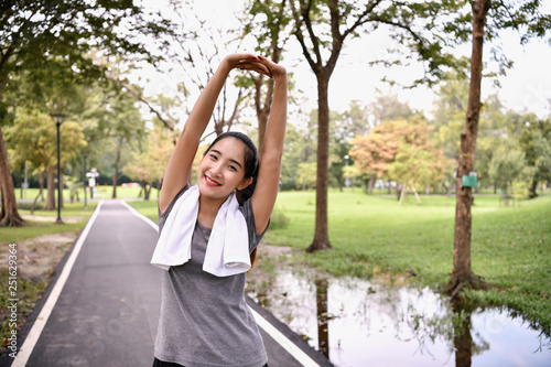Exercise concept. beautiful girl is exercising in the park. Beautiful girls spend their free time exercising.
