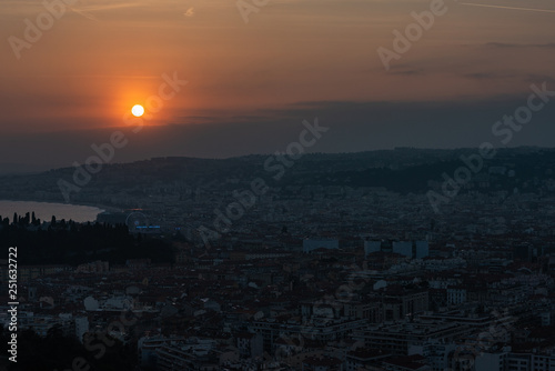 Nice view of the city at sunset from a height © nikolas