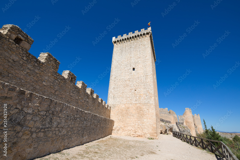 turret and rampart in castle of Penaranda de Duero village, landmark and public monument from eleventh century, in Burgos, Castile and Leon, Spain, Europe