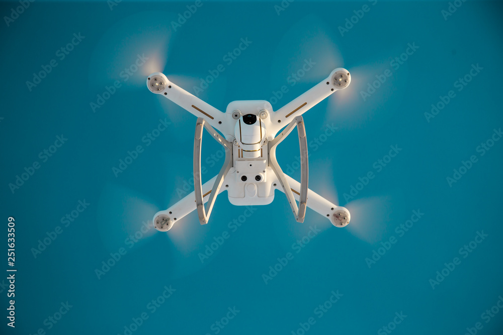 radio-controlled drone flies on a clear winter day radio-controlled drone flies on a clear winter day
