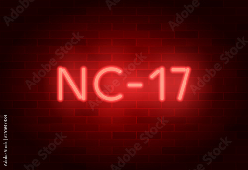 NC-17 rating sign. Vector neon sign on brick illuminated wall