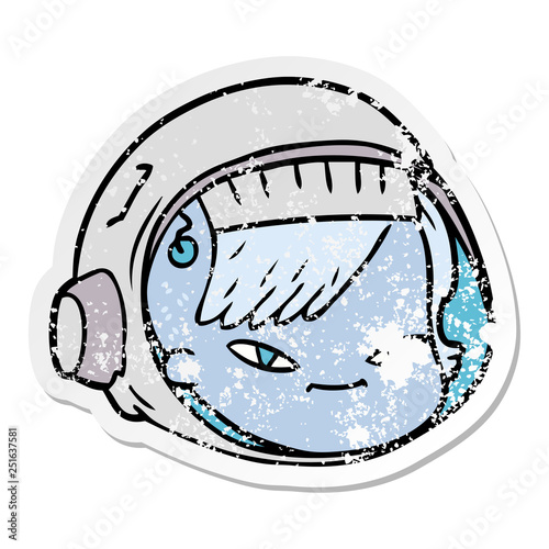 distressed sticker of a cartoon astronaut face