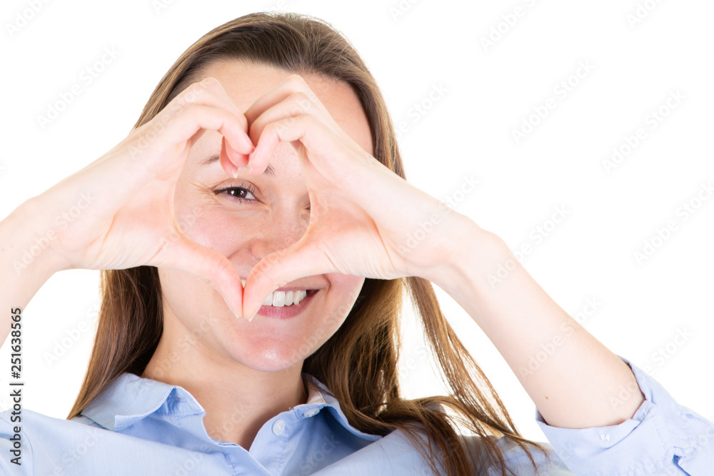 Young beautiful woman happy showing love with hands fingers in heart shape expressing love and marriage symbol