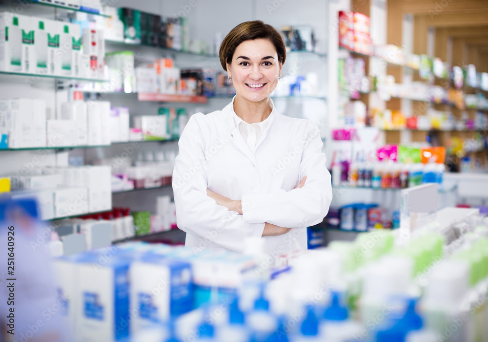 female pharmacist demonstrating assortment of pharmacy