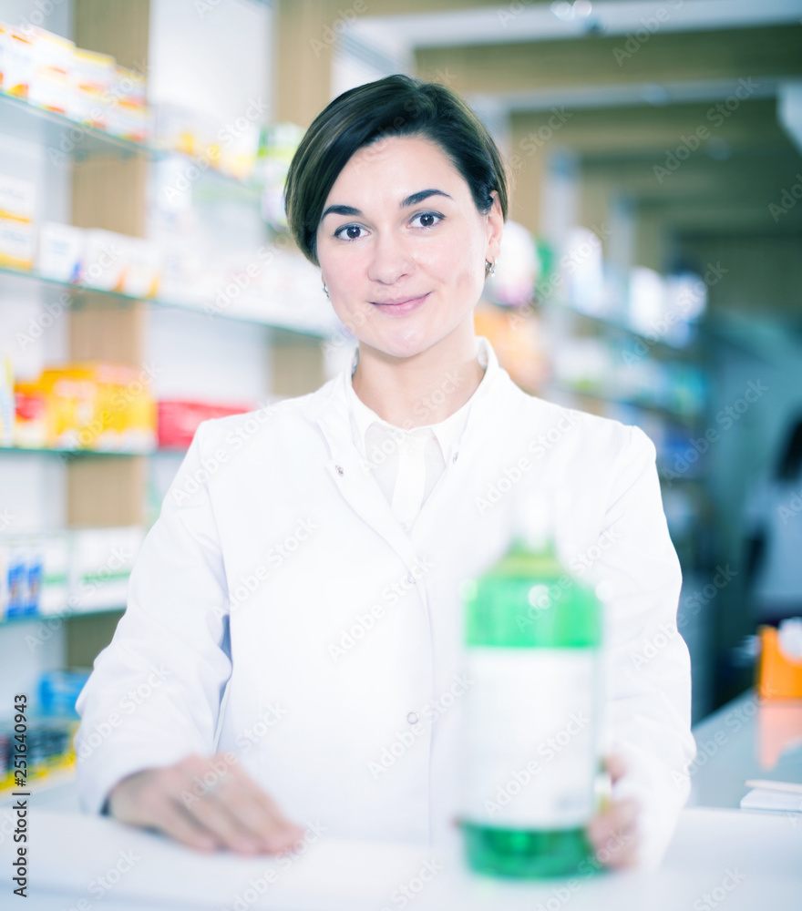 Pharmacist ready to assist in choosing at counter